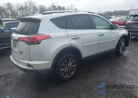 2016 Toyota Rav4 Limited z USA, uszkodzony, nr VIN 2T3DFREV3GW529036